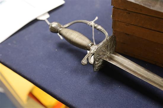 A 17th century English silver and steel hilt Horsemans sword, 37.5in.